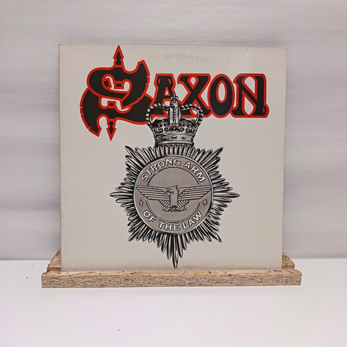 Saxon strong arm of the law vinyl record VG+/VG+ CAL 120