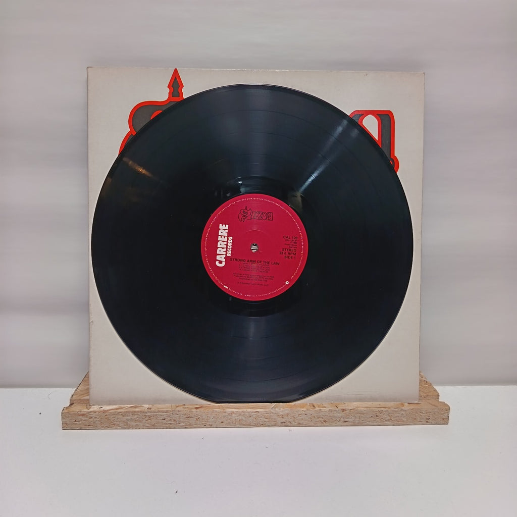 Saxon strong arm of the law vinyl record VG+/VG+ CAL 120