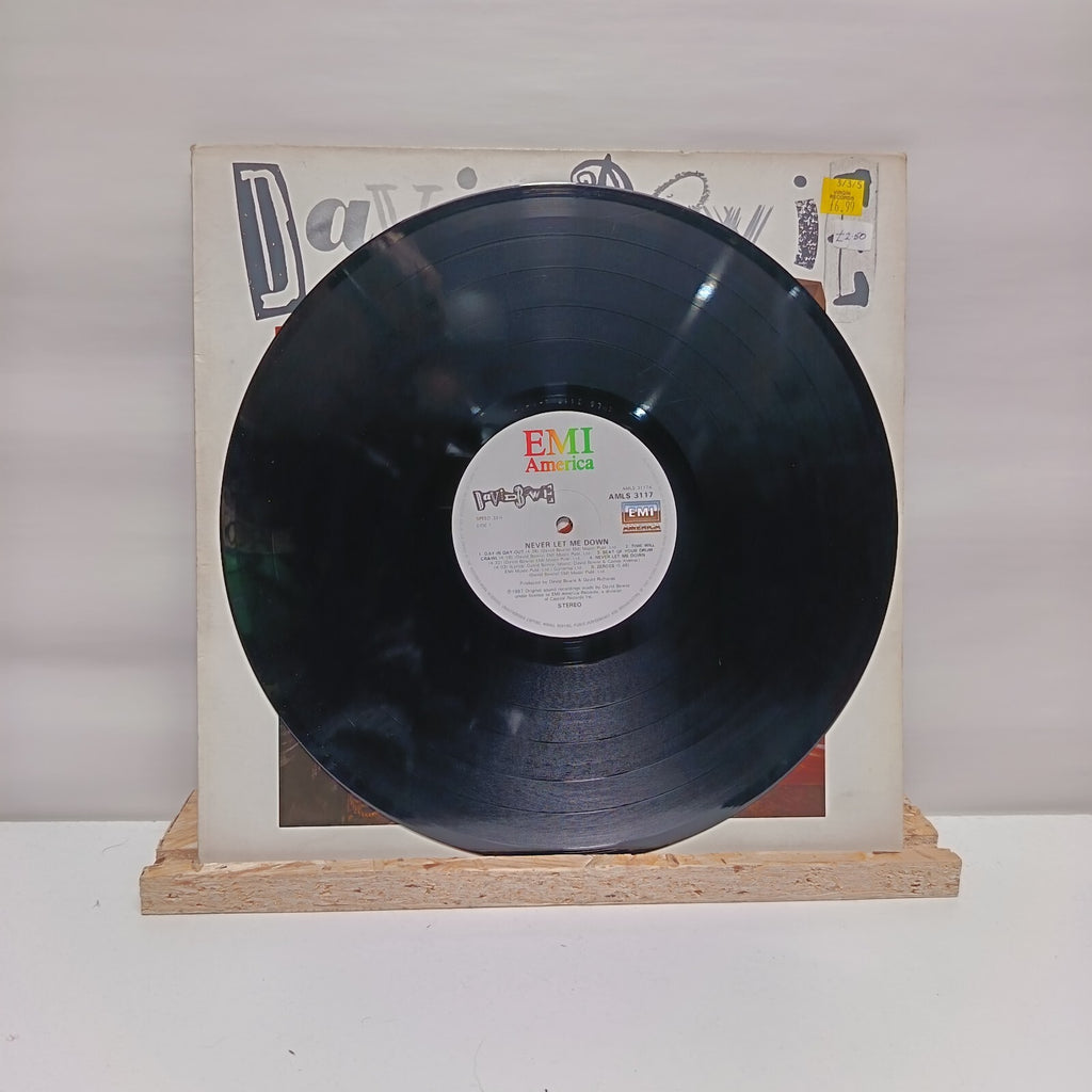 David Bowie never let me down viny record VG+/VG+ AMLS 3117
