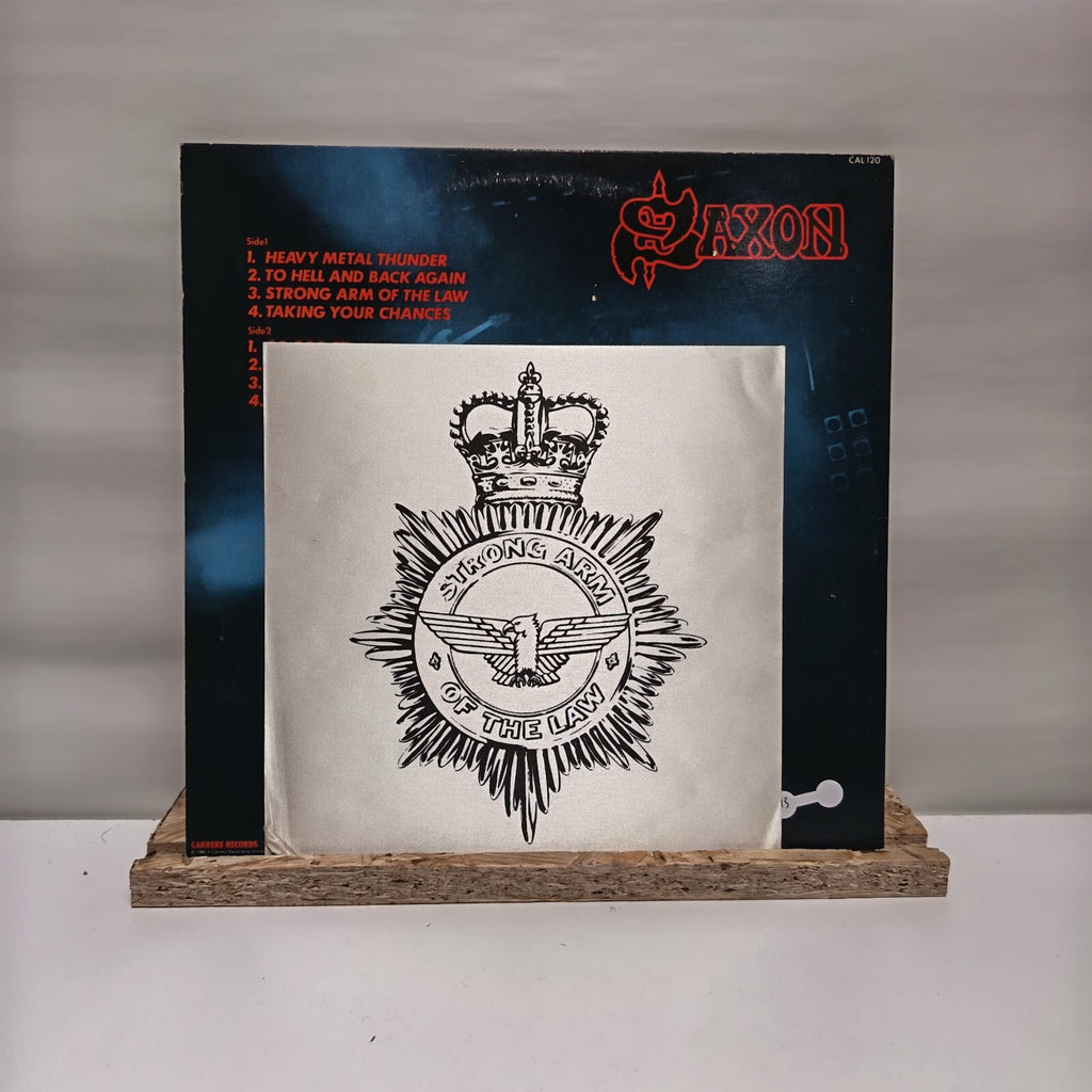 Saxon strong arm of the law vinyl record VG+/VG+ CAL 120